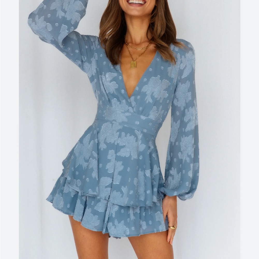 Francesca’s Floral Blue Ruffled Romper